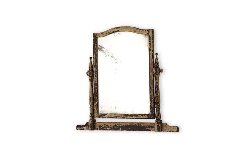 You are viewing an original 19th century pivoting mirror. The original white chip paint has great character on the mirror with aged flection. The mirror can be mounted on the wall or attached easily to a wooden back plate to finish off a dresser or