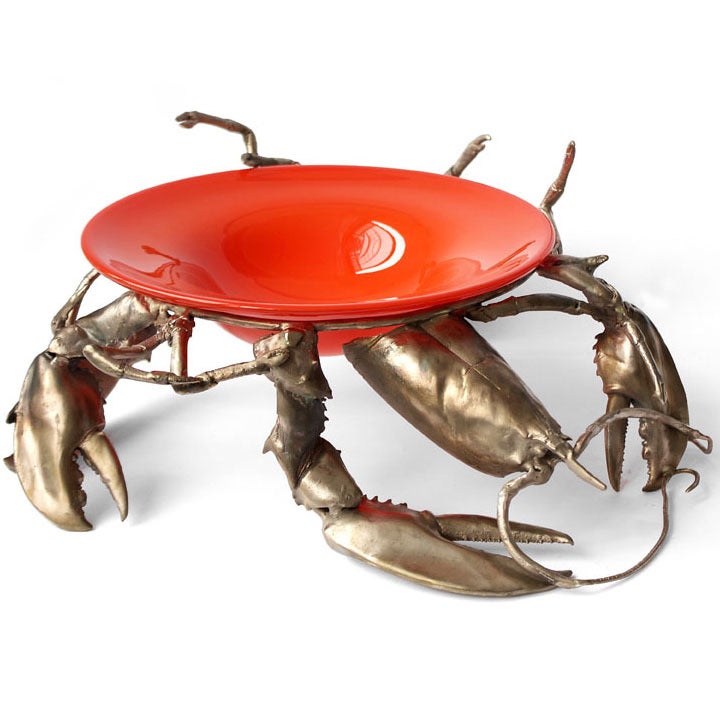 The Lobster Bowl by New York-based artist Joan Sherman has a solid, cast-bronze base and a bright-orange, hand-blown 12