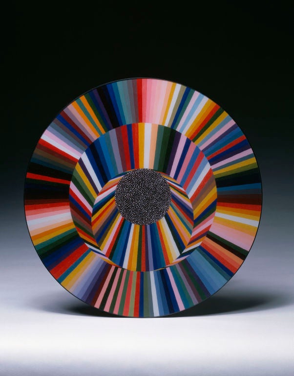 The laminated glass surface of this beautiful cake platter by Lucas Samara is based on an optical painting by the artist from the 1970s. The sleek black spun aluminum base is made of three conical shapes which perfectly balance this unique