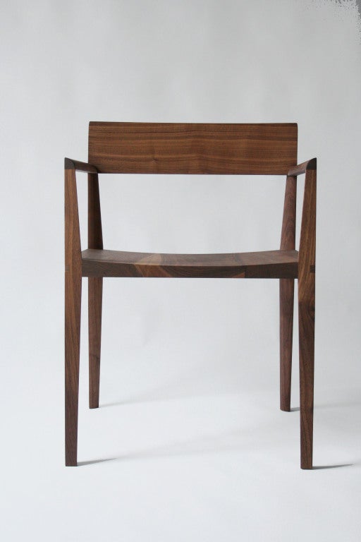 Quarter Round Armchair
designed 2008
29 ¼ h x 21 w x 20 ½ d, inches
seat height: 17 inches
arm rest height: 26 ¼ inches
available in a variety of woods and finishes 

Each of the pieces from the Quarter Round series by sculptor Christopher Kurtz is