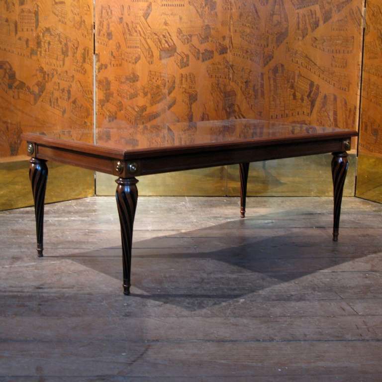 A good quality, mid 20th century French mahogany and ebonised coffee table in the style of Maison Jansen. Glass replaced. This elegant and stylish coffee table will work well in any setting, either classic or contemporary. 

