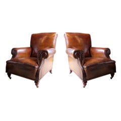 A comfortable pair of 19th century English library chairs