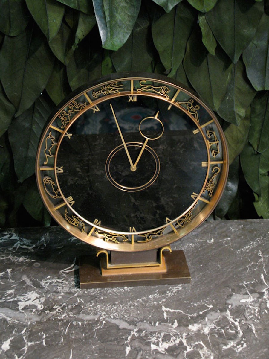 A very elegant and charming, Art Deco period, mantle clock representing the 12 Zodiac signs.