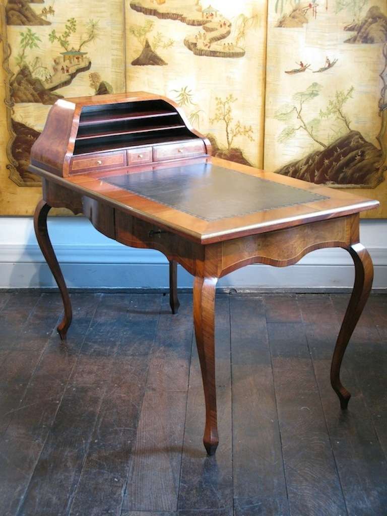 A wonderfully shaped, 19th century Swedish desk, in the Rococo taste, with a lovely colour, that will work well in most settings. 

Additional Measurements: 29.5 inches high to writing surface.

Sweden