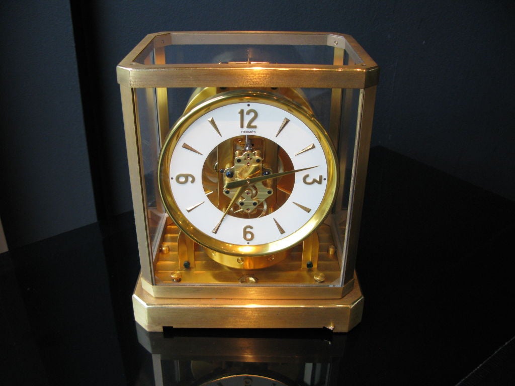 A rare Hermes gilded brass Atmos clock by Jaeger-LeCoultre. This model is the Calibre 519 circa early 1960s.<br />
The Atmos clock went into production in 1936 after several years in design by Jean-Leon Reutter. The clock is driven by small changes