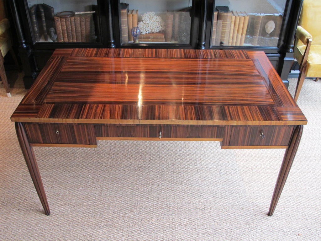 A very stylish, and of fine quality, circa 1930s, French Art Deco desk, of elegant proportions, in Macassar ebony and satinwood, that will make a statement in any setting.