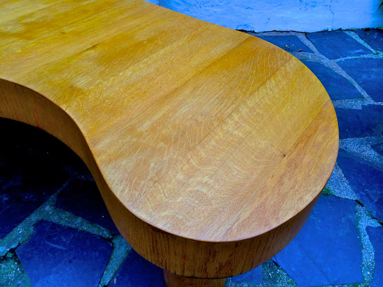 Jean Royère documented rare blond tri-legged oak model flaque coffee table.