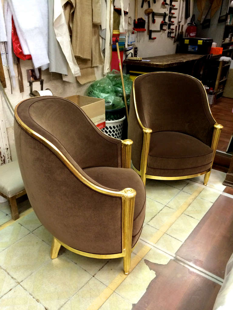 Andre Groult very large pair of corbeille chairs newly gold leaf and brown velvet reupholstered.
