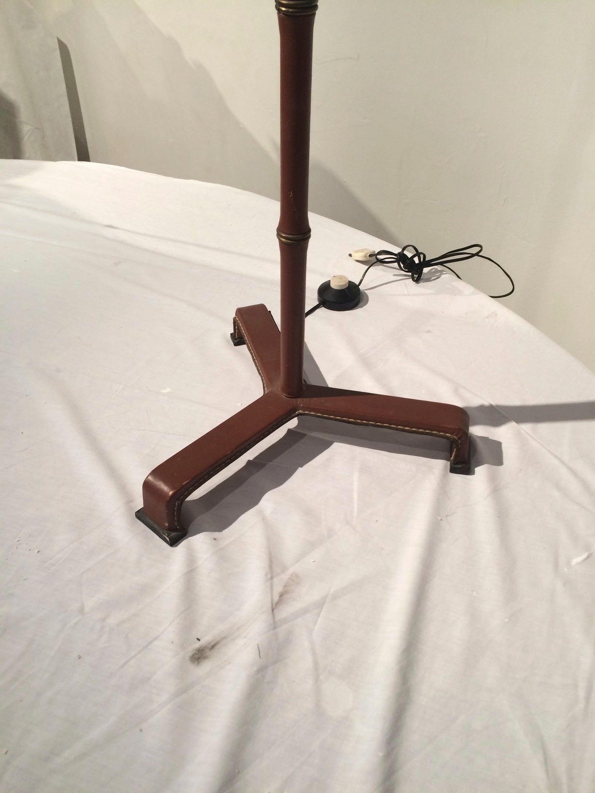 French Jacques Adnet Rarest Brown Hand-Stitched Leather Tripod Standing Lamp For Sale