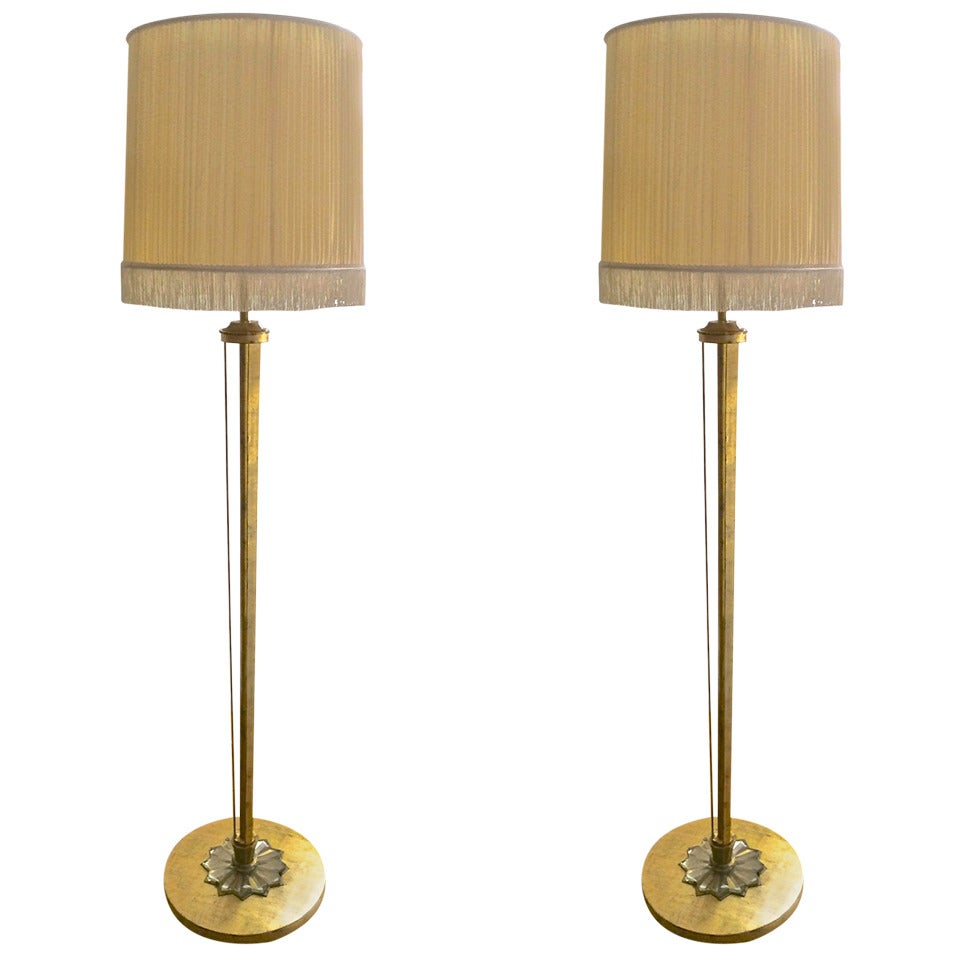 Maison Petitot Pair Of Gold Leaf Standing Lamps With A Beautiful Glass Detail