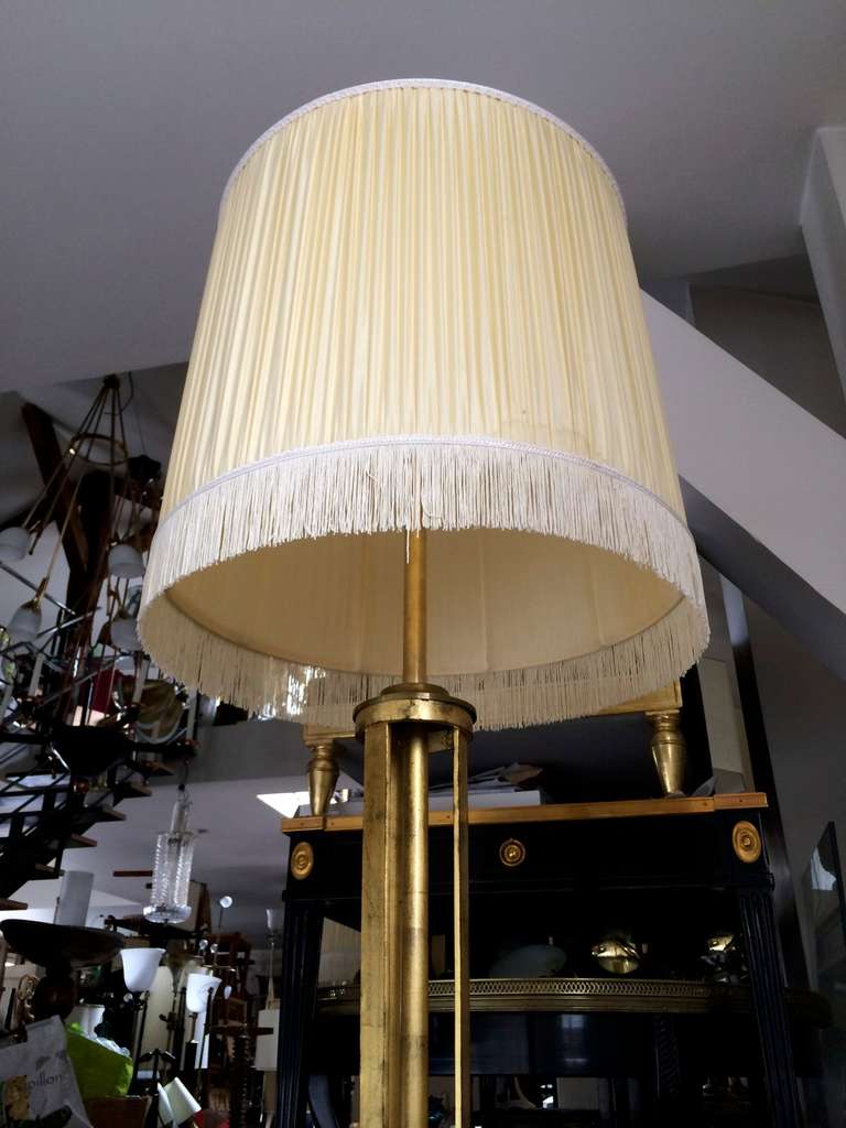 French Maison Petitot Pair Of Gold Leaf Standing Lamps With A Beautiful Glass Detail