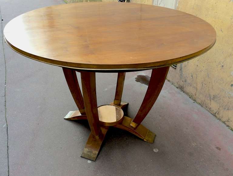 Maison gouffé signed beautiful 1940's round dining table with bronze sabot and mirror center extendable with leaves(not available)