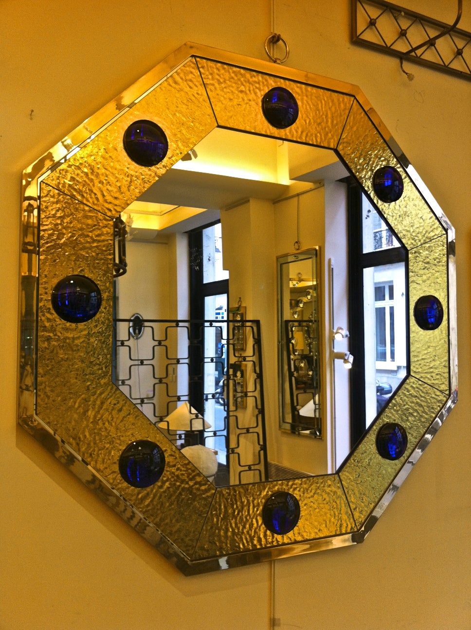 spectacular octogonal mirror with gold leaf effect frame by Andre Hayat