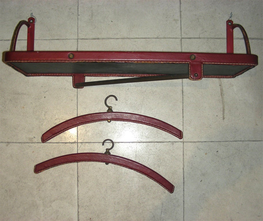 Mid-Century Modern Jacques Adnet Rare Pair of 'Hermes Red' Stitched Leather Shelves and Two Hangers For Sale