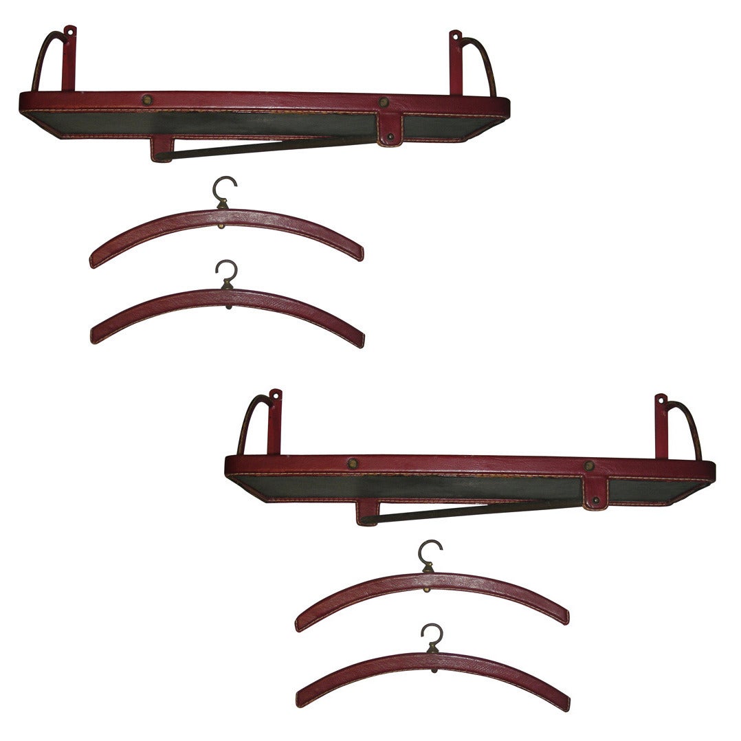 Jacques Adnet Rare Pair of 'Hermes Red' Stitched Leather Shelves and Two Hangers For Sale