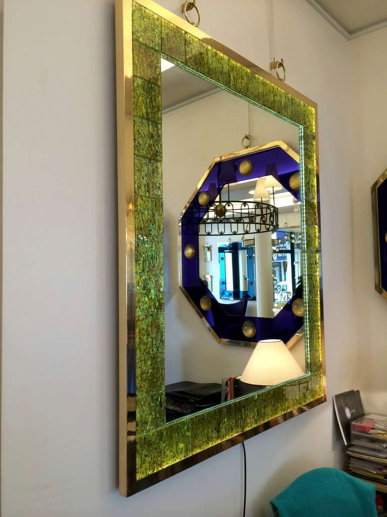 André Hayat contemporary lighted mother-of-pearl yellow glass mirror with gold bronze frame and hanging rings.
