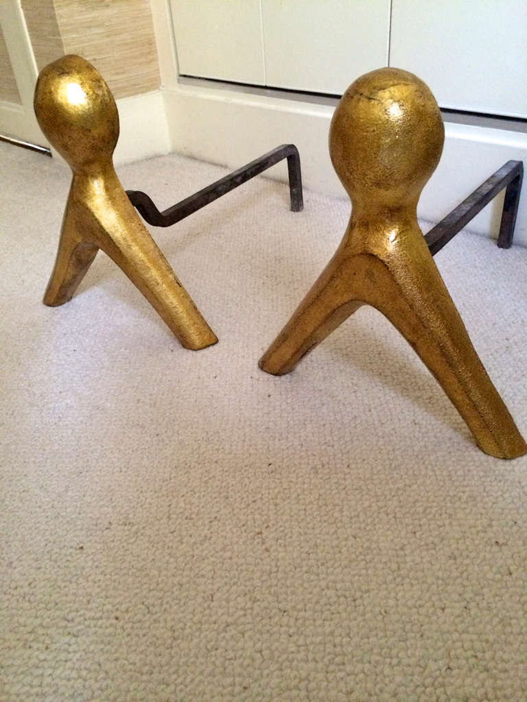 French 1950s pair of wrought iron andirons with gold leaf abstract figures