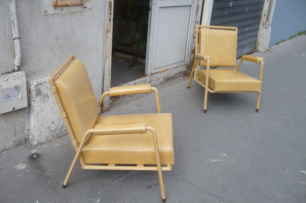 Mid-20th Century Rare Pair of Hand Stitched Leather Arm Chairs by Jules Leleu