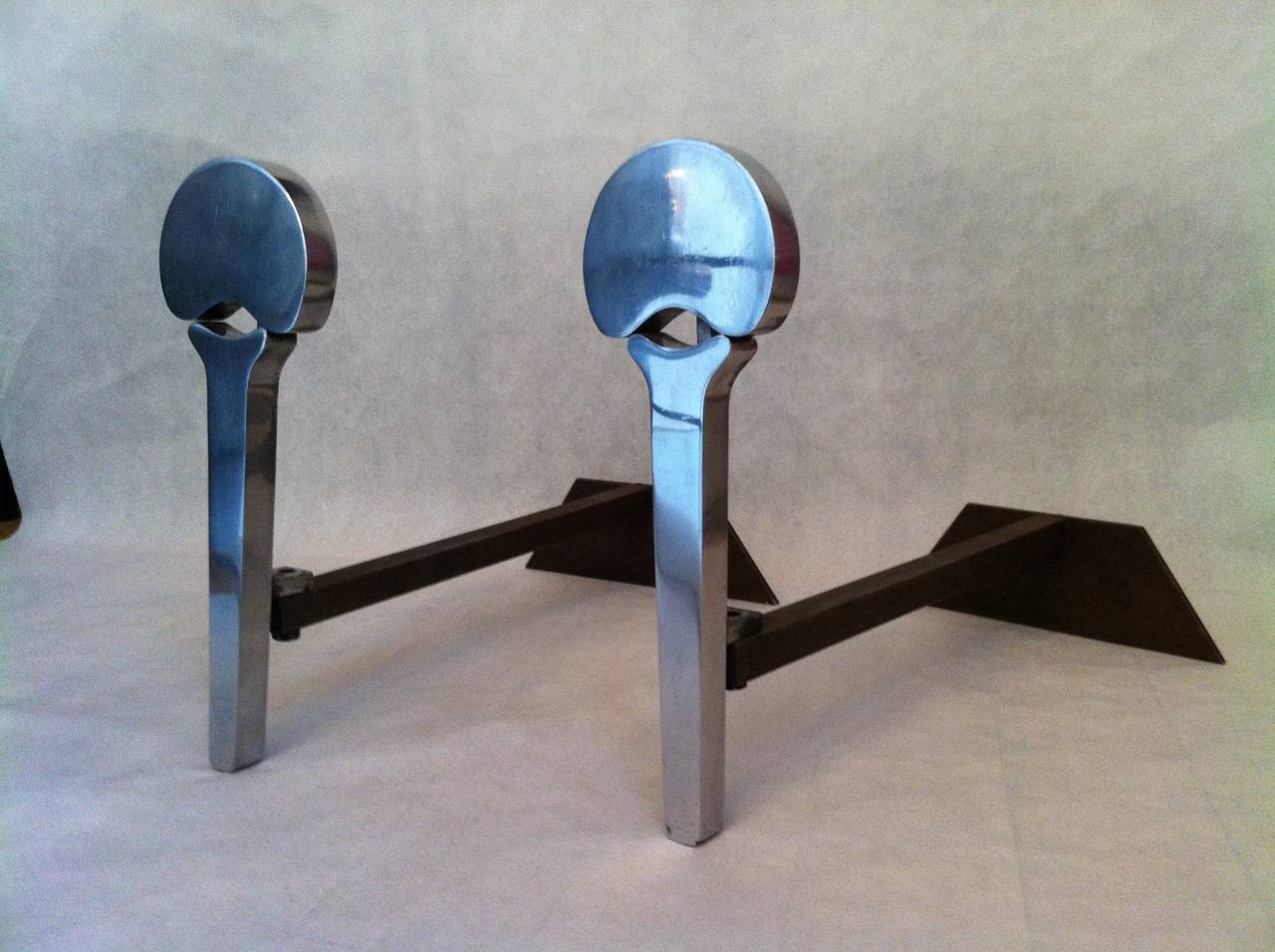 Francois Monnet 1970s pair of brushed steel andirons.