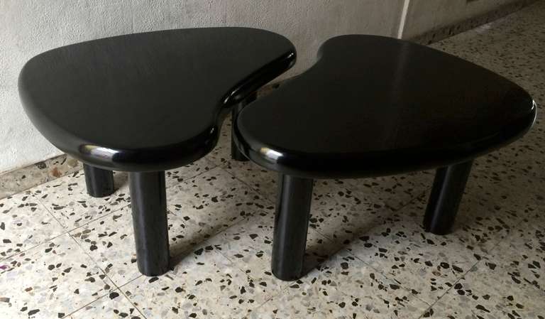 Charlotte Perriand pair of kidney black pine coffee tables.