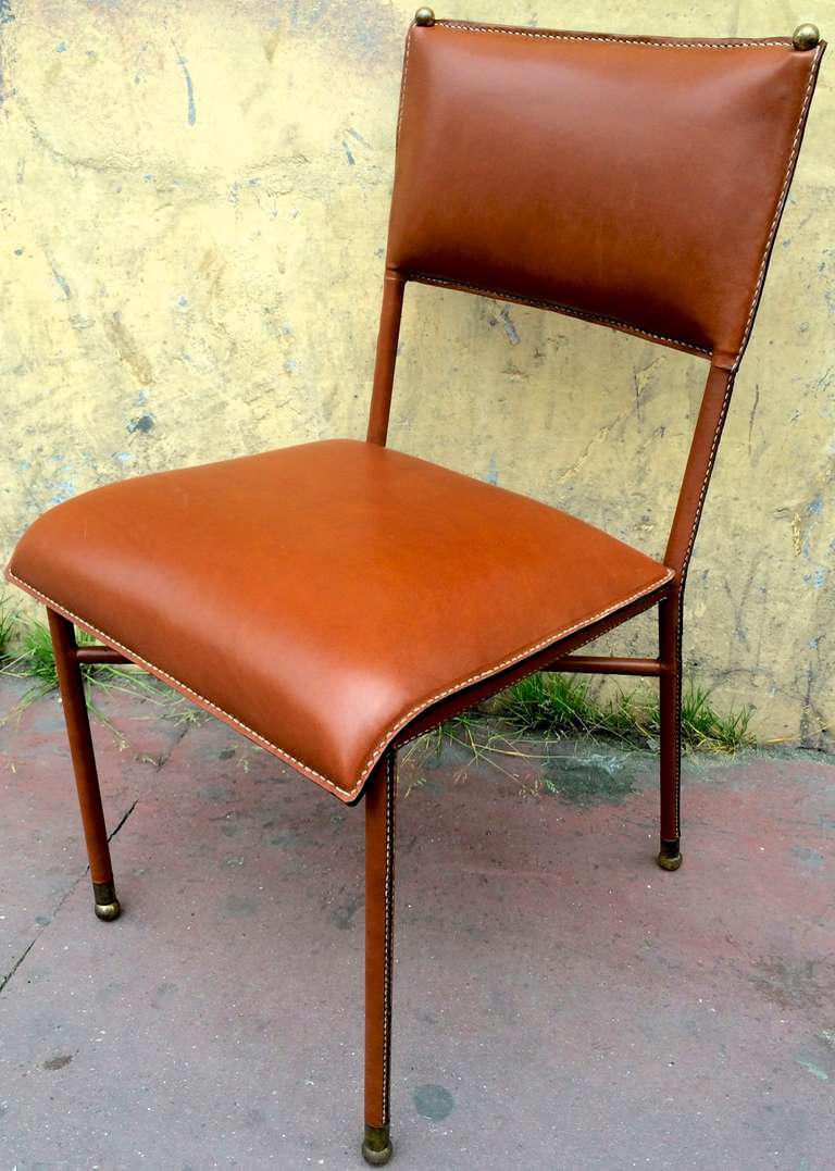 Jacques Adnet 50's set of 4 chairs in brown hand stitched leather