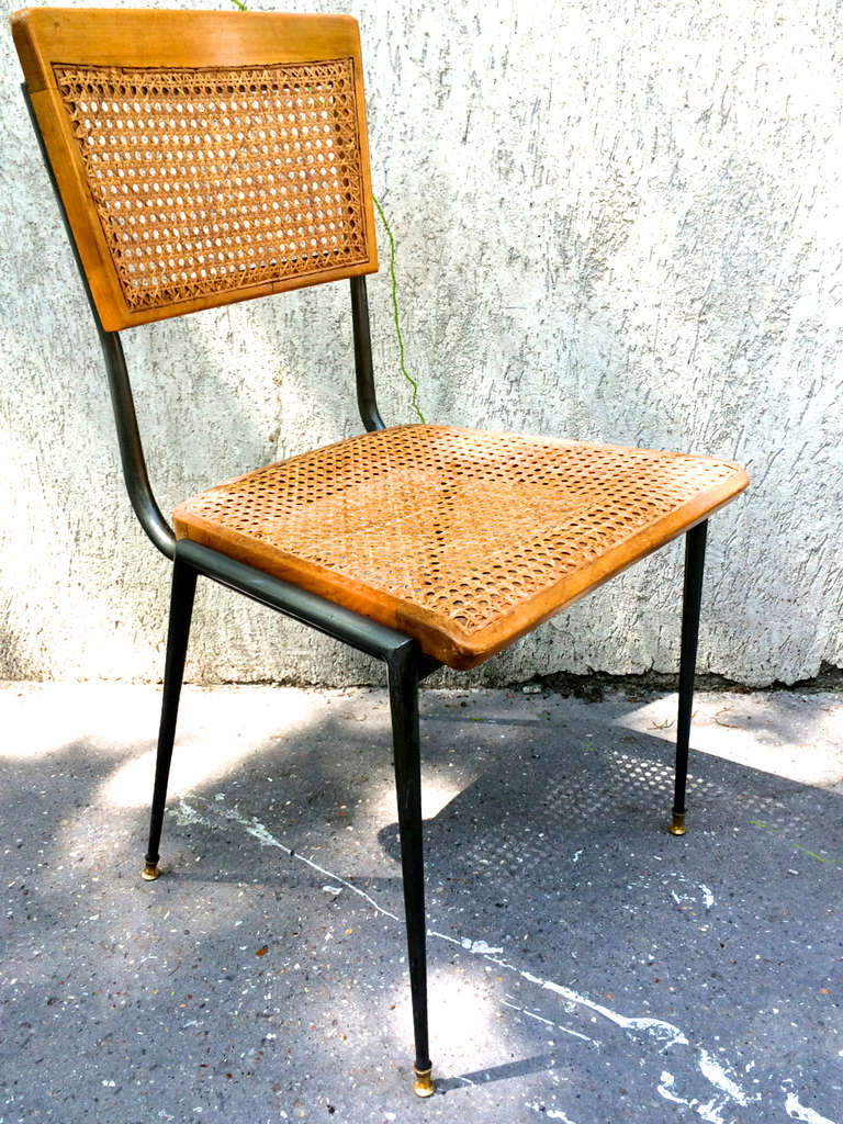 Jules & Andre Leleu rare set of eight dinning chairs with canning seat and metal legs
ending by bronze sabot in vintage condition.