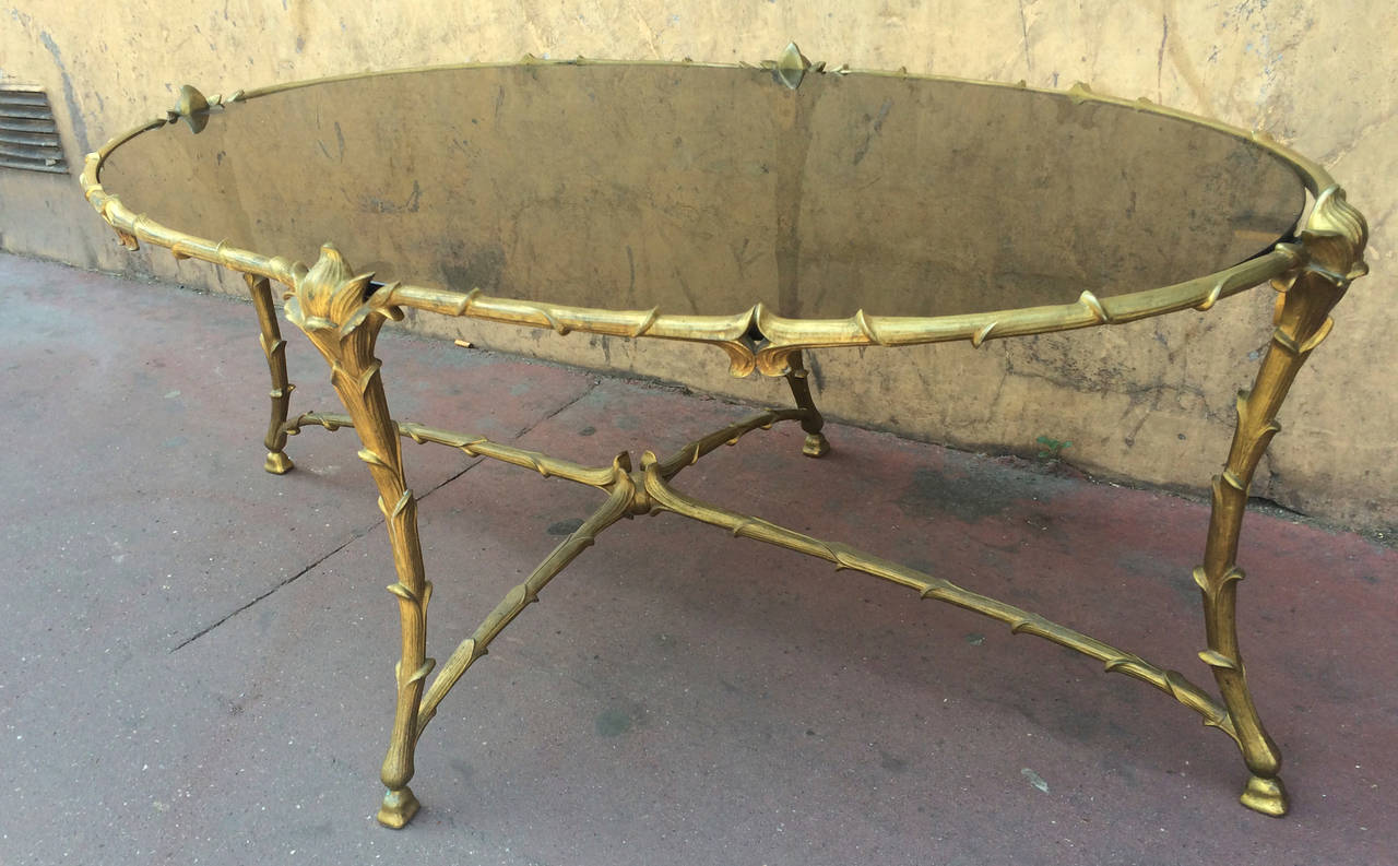 Superb quality gold bronze Maison Baguès oval coffee table.