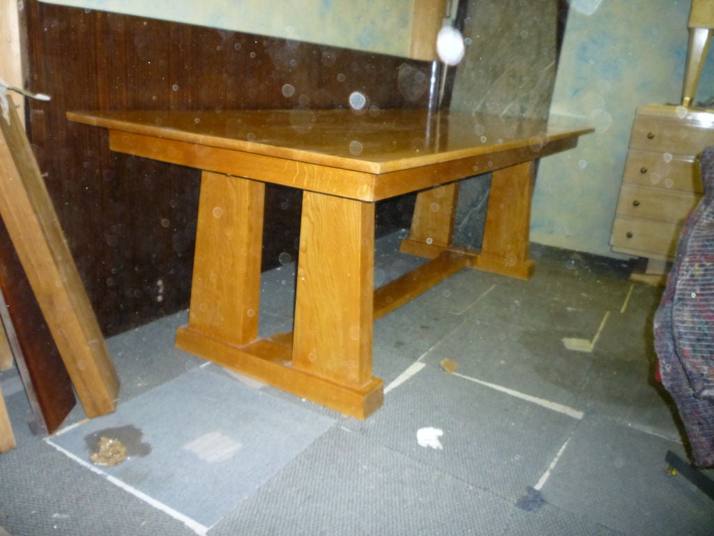 Neoclassic long solid blond oak dining table with antique Egyptian legs attributed to marc duplantier.