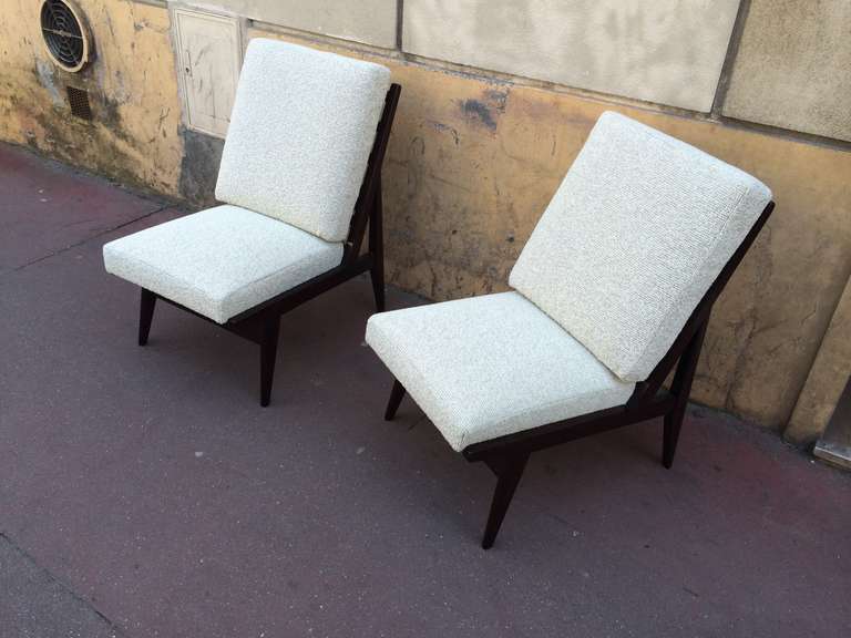 Pair of French 1950s slipper chairs with a pure design newly recovered in Maharam.