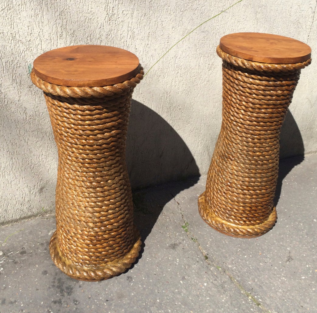 Spectacular Riviera barstools or pedestals from the 1950s in thick rope.