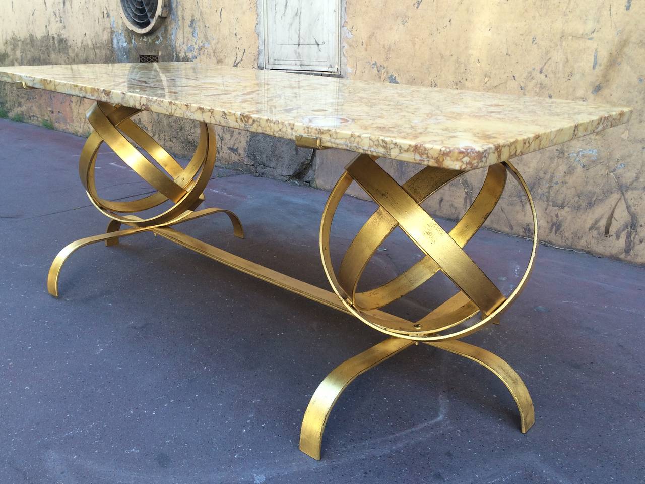 Spectacular Two Globes Gold Leaf Coffee Table with Fossil Marble Top For Sale 1