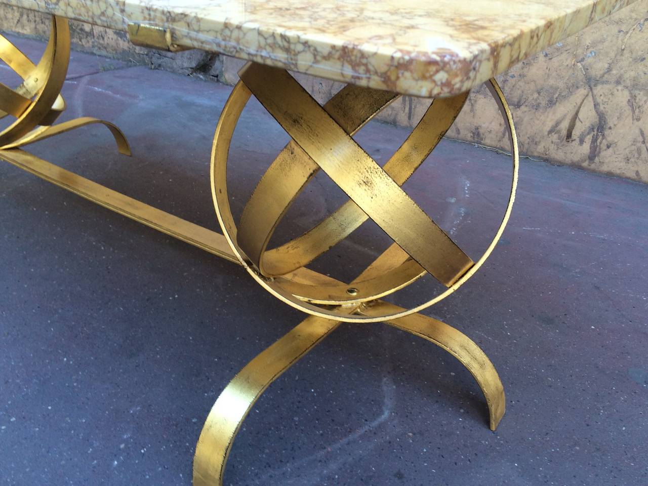 Mid-20th Century Spectacular Two Globes Gold Leaf Coffee Table with Fossil Marble Top For Sale