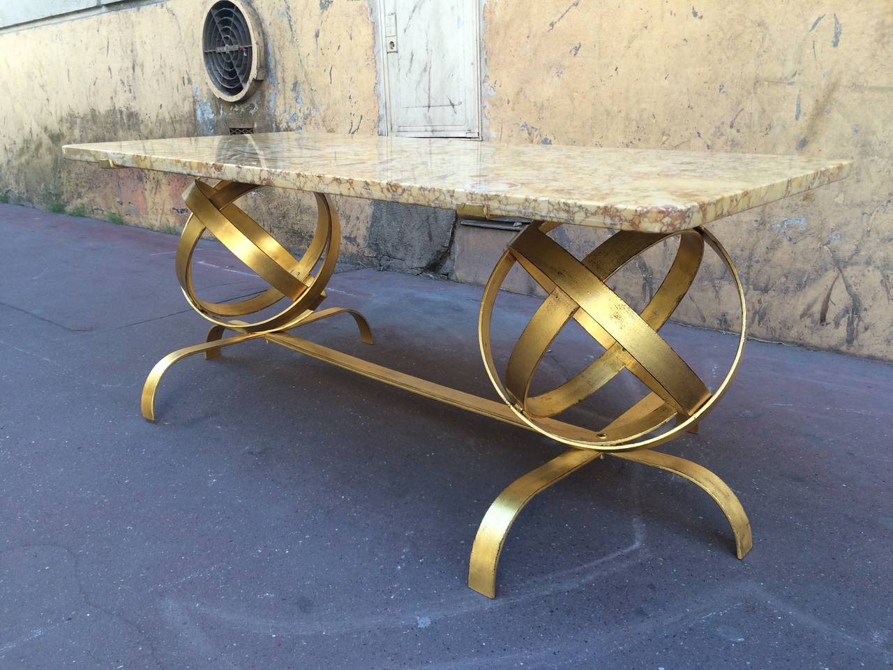 Gilt Spectacular Two Globes Gold Leaf Coffee Table with Fossil Marble Top For Sale