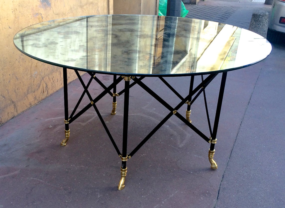 Maison Jansen spectacular round dining table with a thick eglomized mirror top.