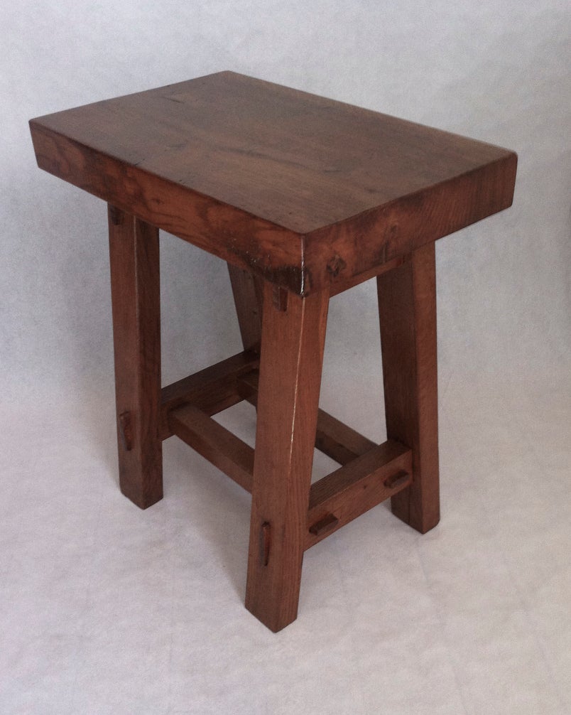 French set of four organic stool in rustic pine with a pure design.