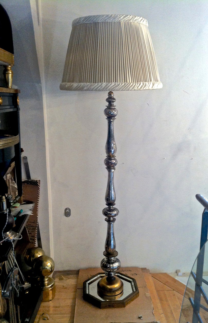 Maison Bagues rarest 1940s mercury glass standing lamp with gold leaf wood
details.