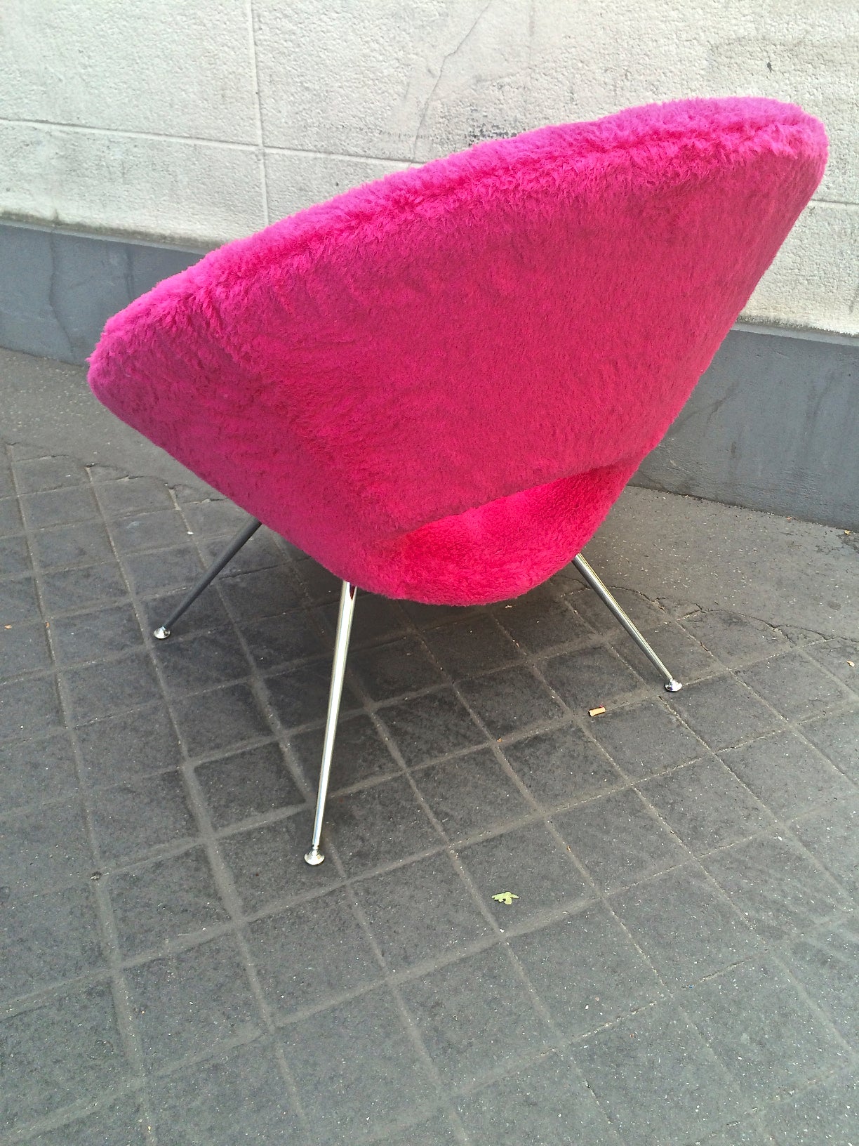 Pair of pink wool faux fur 1970s flying saucer chairs.