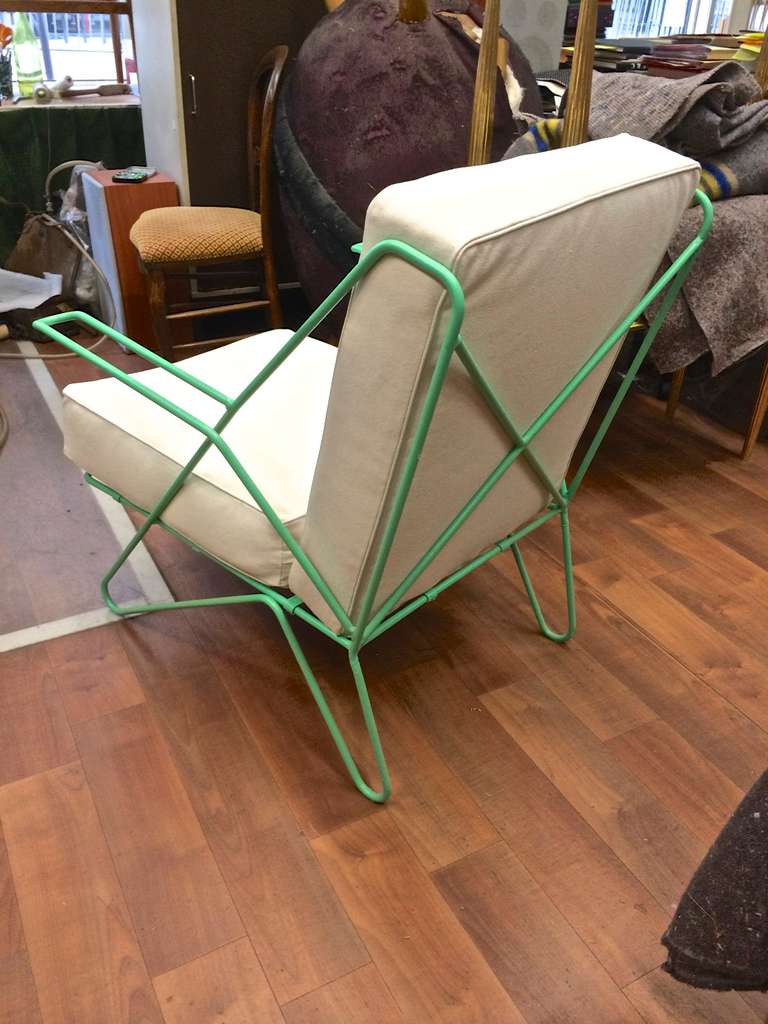 Raoul Guys rarest pair of aqua metal lounge chairs newly recovered in canvas cloth.