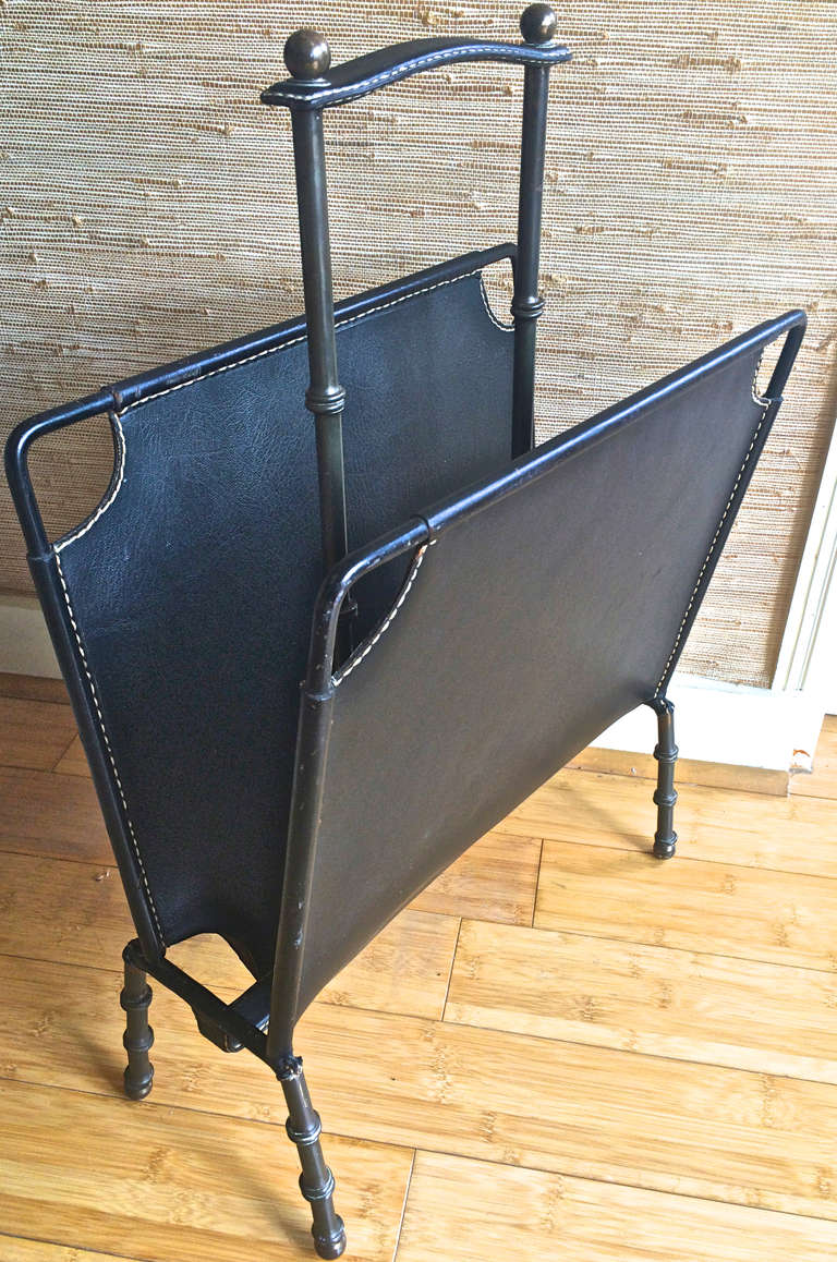Jacques Adnet 1950s black hand-stitched magazine rack in good vintage leather and patina condition.