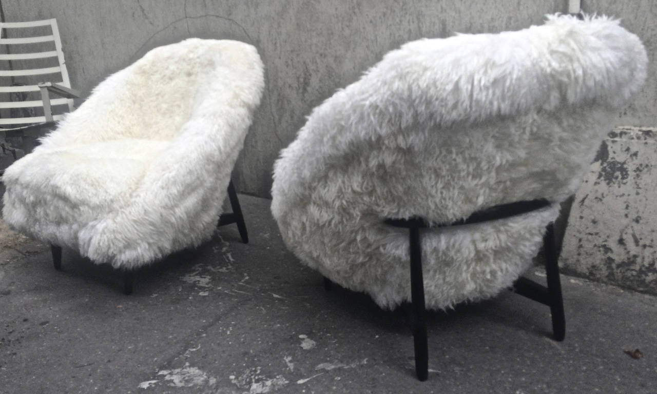 Theo Ruth for Artifort, 1950s chairs newly covered in sheep fur.