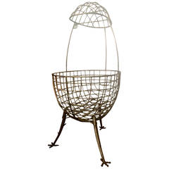 Egg-Shape Cradle in Sculptured Wrought Iron with Chicken Legs
