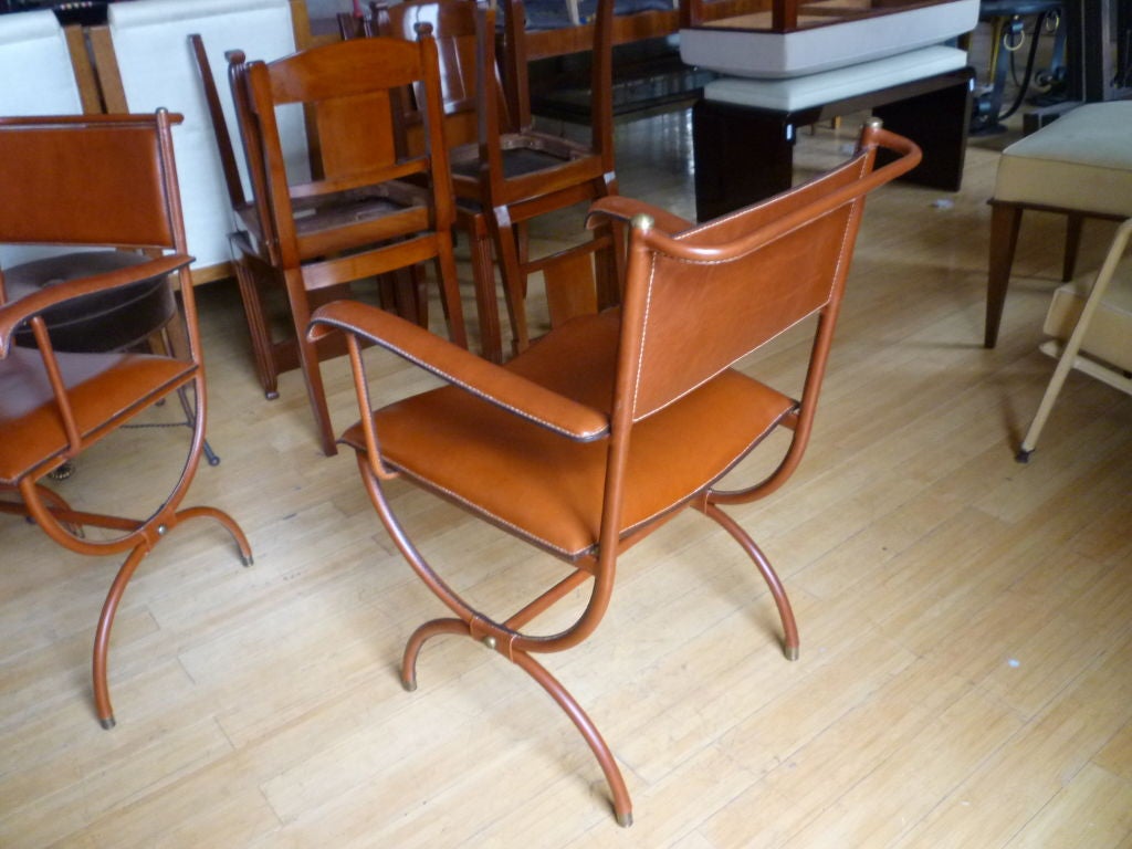 French Jacques Adnet Pair of Armchairs in Hand-Stitched Brown Leather For Sale