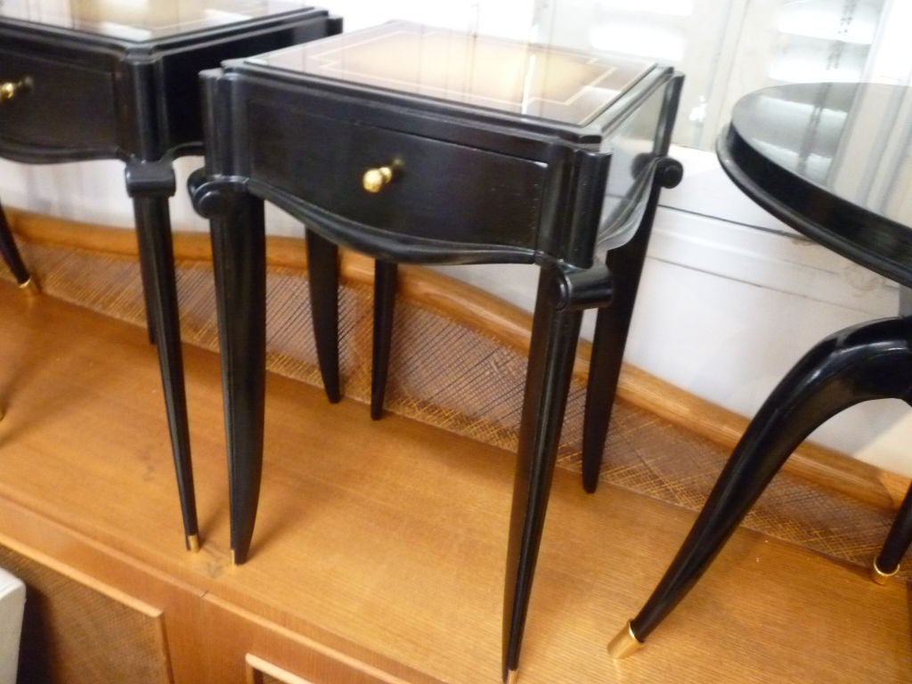 Black varnish and gold sabot side table by Jean Pascaud.