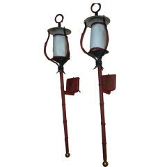 JACQUES ADNET pair of lantern sconces in red stitched leather