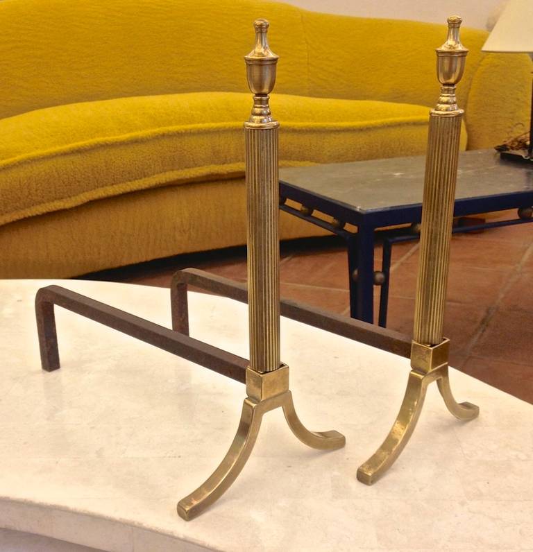 French neoclassic chic 1950s pair of brass andirons.