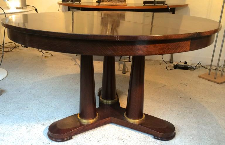 jean royère tripod round dinning table with tri pedestal base including two leaves each leaf is 20" (52cm) long X2