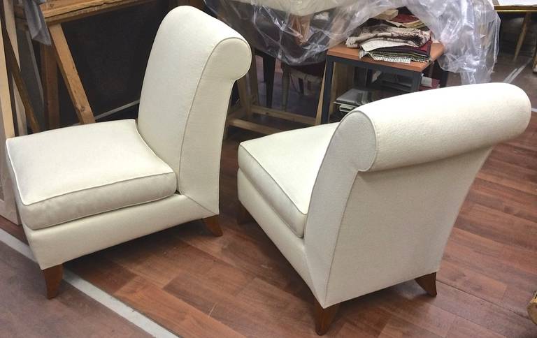 Maison Dominique pair of slipper chairs with elegant design and newly restored.