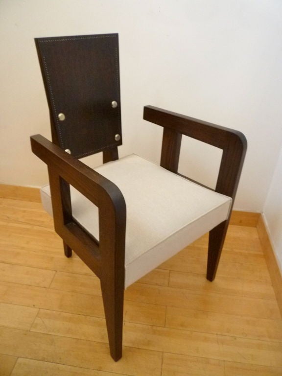 single nailed Modernist oak armchair designed by Andre SORNAY, french polished<br />
and newly reupholstered