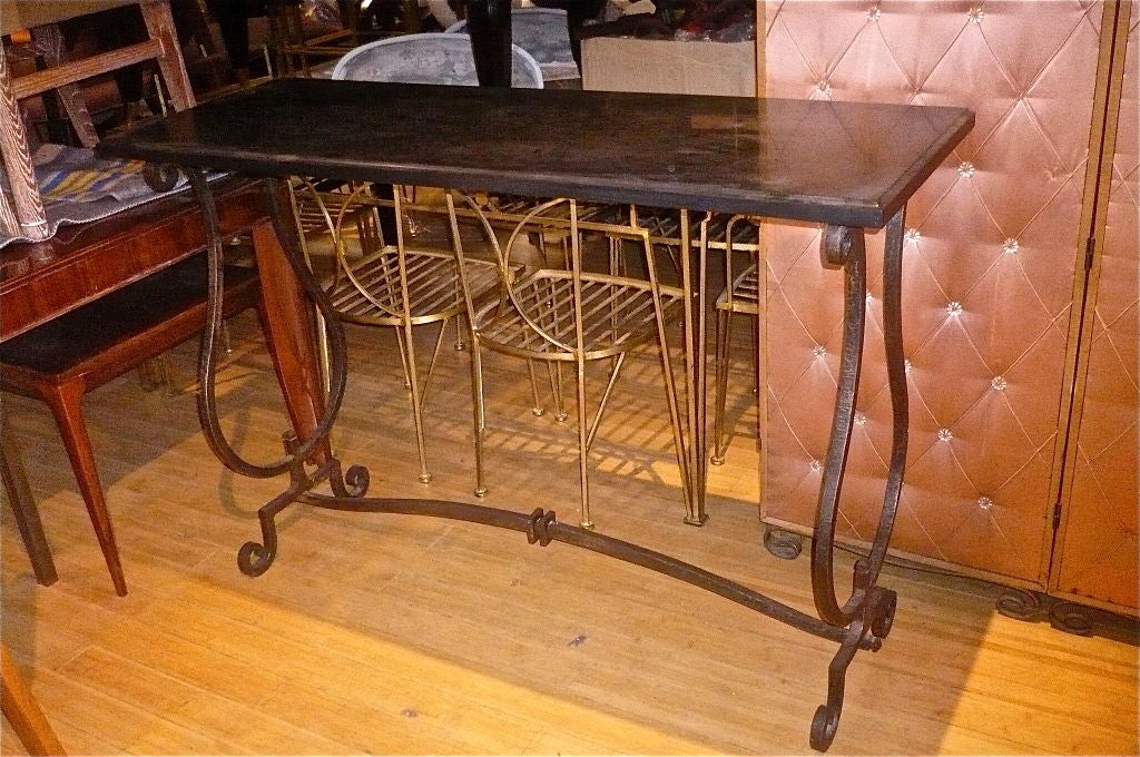 Gilbert Poillerat Console in Wrought Iron with Black Marble Top In Fair Condition For Sale In Paris, ile de france