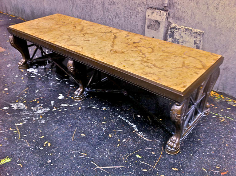 Maison Jansen spectacular huge 1940s long consistent neoclassic coffee table
in patinated cast iron and marble top.
